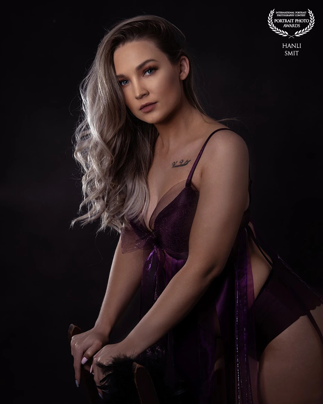 Natasha, one of my favorite models, dressed in a purple ribbon outfit made by myself with her gorgeous hair showing off in the back lighting