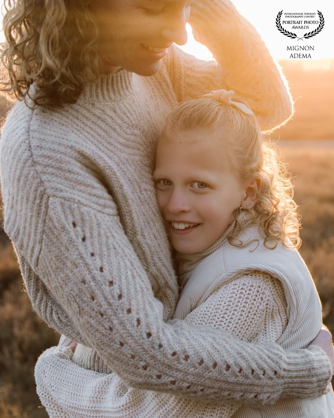 Another award-winning image…<br />
But this is so much more than just a ‘pretty picture’.<br />
<br />
It’s safety. Trust. A moment where everything feels right.<br />
A mother and her daughter, wrapped in golden evening light.<br />
<br />
This is why I do what I do.<br />
Because so often, mothers live behind the scenes.<br />
And I want you to be seen.<br />
The love. The softness. The strength.<br />
<br />
I’m proud this photo received an award – but even more proud that I got to capture this moment.