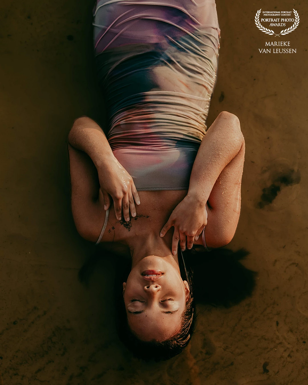 This whole shoot with this beautiful young woman is to this day one of my favorite shoots. Not just because she's a very special human to me, the photos are also one of the best photos I ever took. <br />
<br />
She was lying in the water like it was her natural home. You can see the peace and calmness in her facial expression. Truly a beautiful moment!