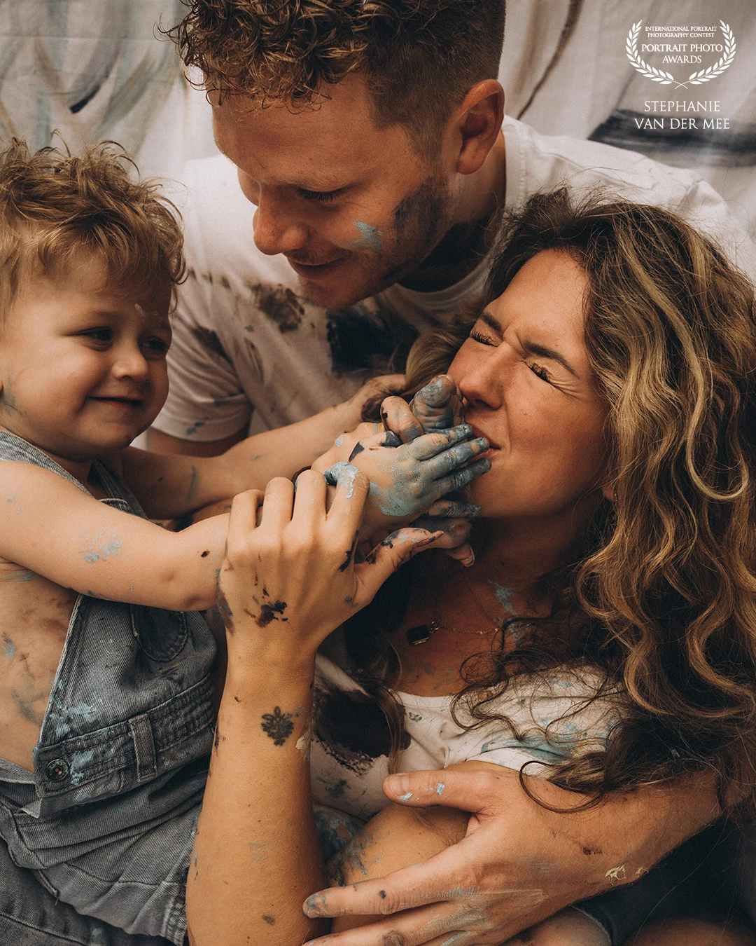 In a whirlwind of colors and giggles,<br />
their love spilled freely—messy, real, and raw.<br />
A paint fight turned into a memory painted on hearts