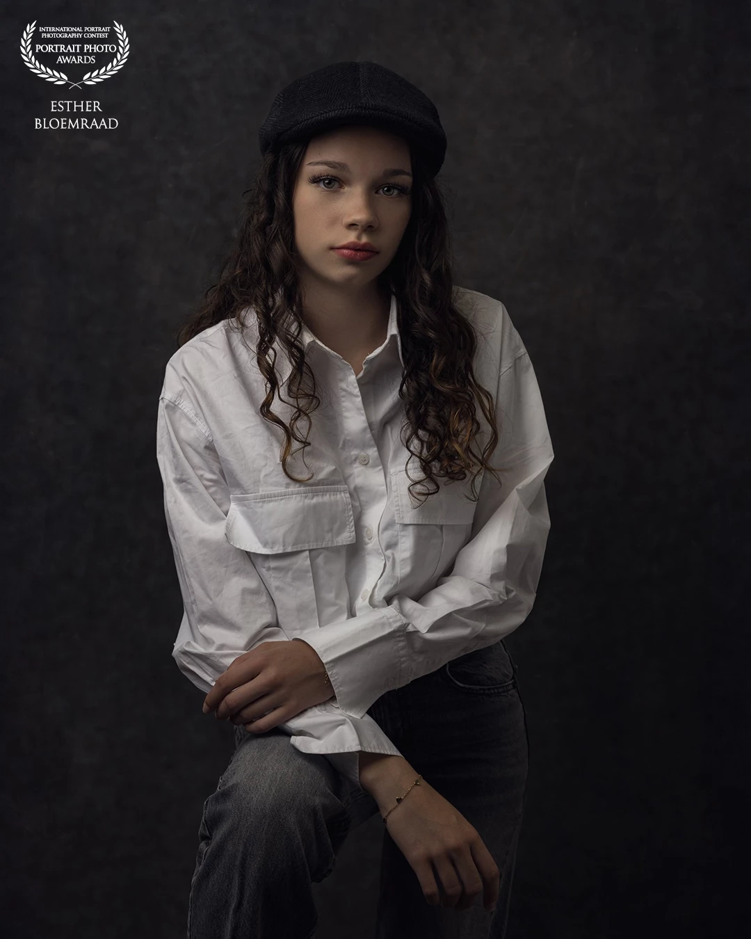 Senna hesitated at first to wear the beret, but she did. In the gentle light, a quiet strength emerges, turning the moment into a serene portrait.<br />
<br />
Model: Senna<br />
Photo & edit: @estherbloemraad.fotografie