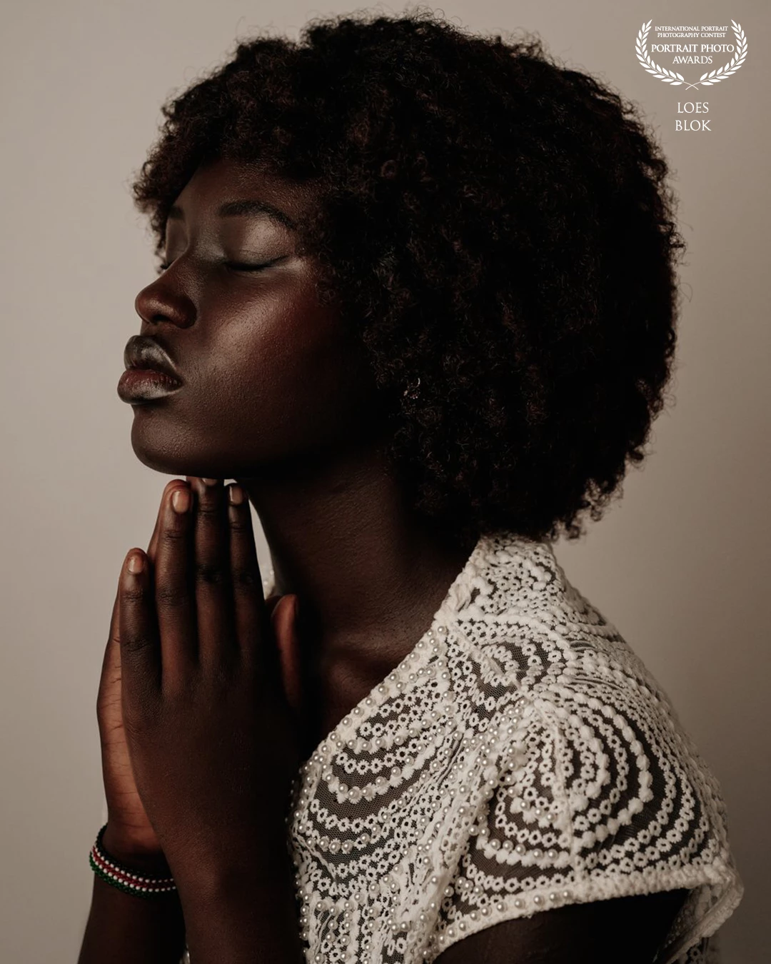 Zikiriat in Portrait<br />
Its the contrast between her beautiful skin against shirt and background that make’s this portrait perfect to me.