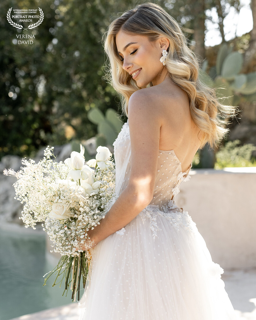 Bridal shooting on a finca in Mallorca. White and Cream very classy style. <br />
<br />
Special thanks to the team:<br />
Concept by: @mosaiquephotography<br />
Decoration & Flowers: @twonakedsouls<br />
Location: @casatwonakedsouls<br />
Rentals: @totapunteventscatering<br />
Keramik: @by.nicita<br />
Dress: @brautzauber_darmstadt x @chicnostalgia<br />
Rings: @verspoor_trauringe<br />
Cake & sweets: @tartamaniabodasmallorca<br />
Jewelry: @dilaaccessoires<br />
Make-up & Hair: @izzygunkel<br />
Models: @victoriabonetv<br />
Stationery: @14shubat