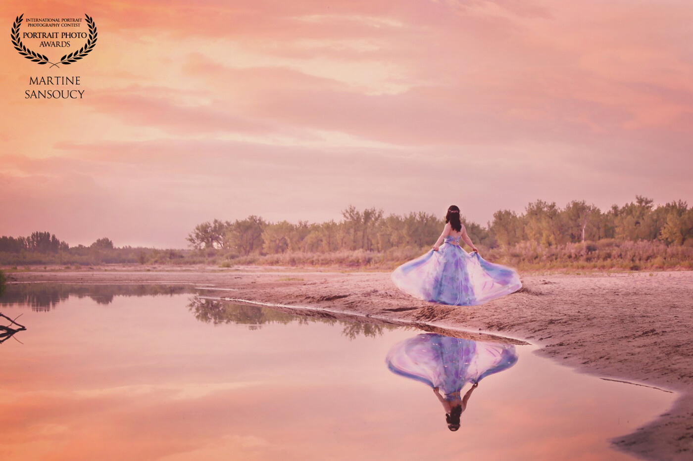 This was the most magical grad session. As the night was ended I caught a perfect reflection of her in the lake and it was just breath-taking with her beautiful gown!